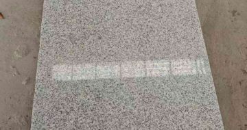 昌都芝麻白光面毛板