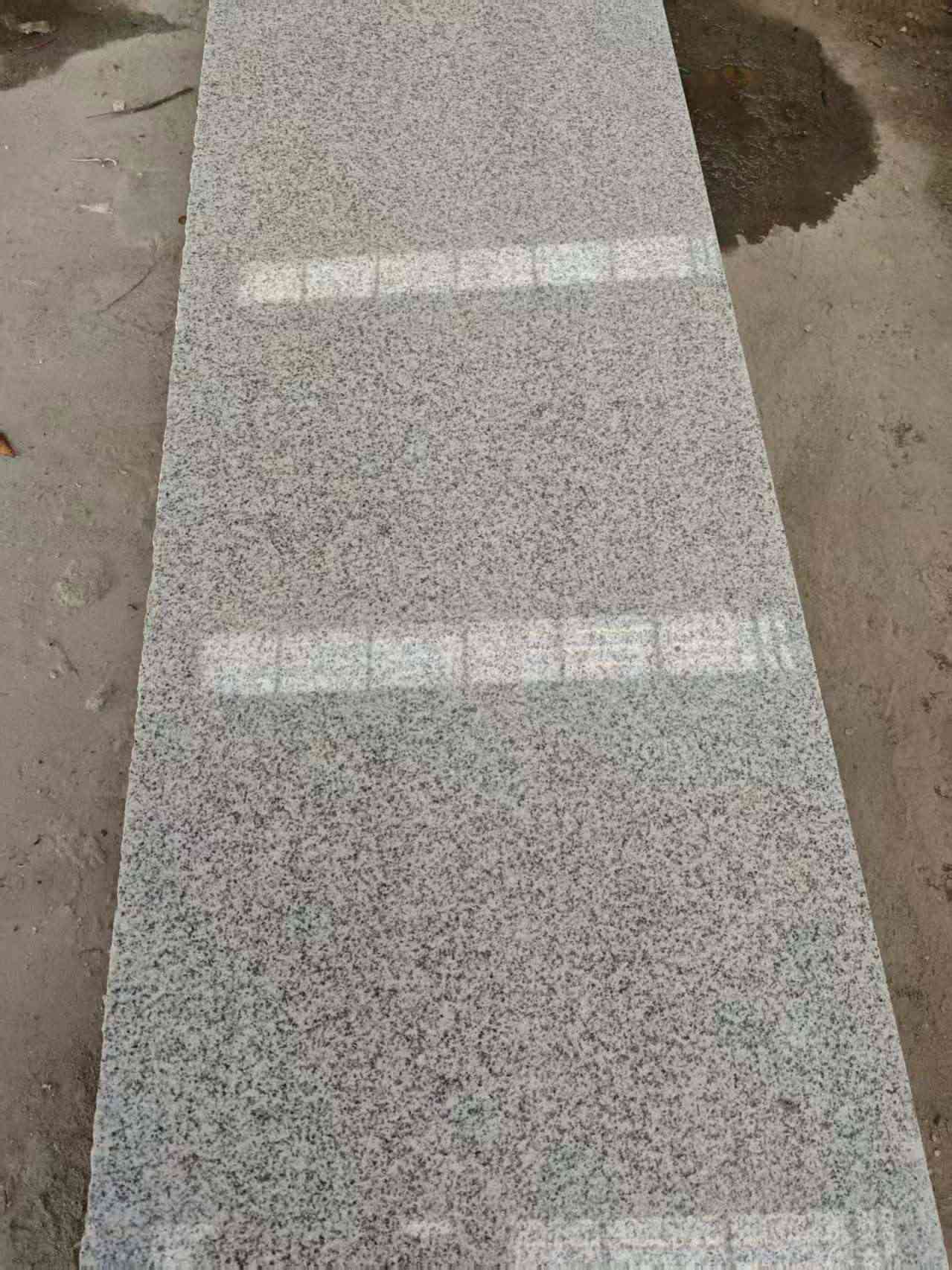 昌都芝麻白光面毛板